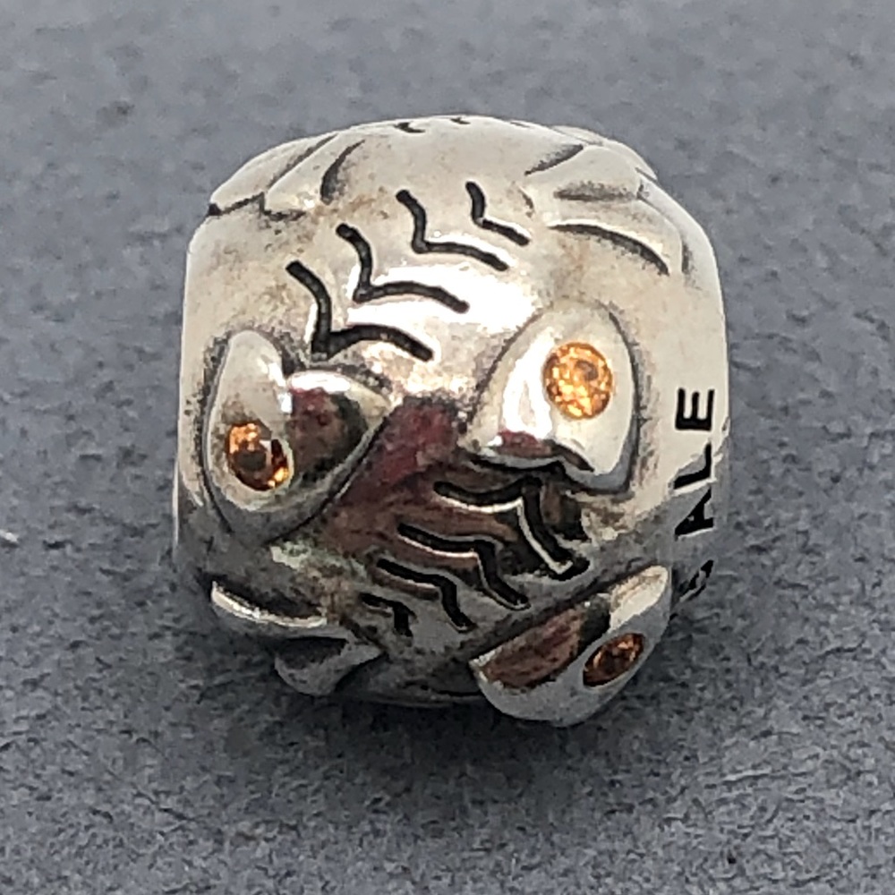 Pandora Fish Bone with Orange CZ Charm.